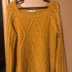 Maurice’s gold sweater
